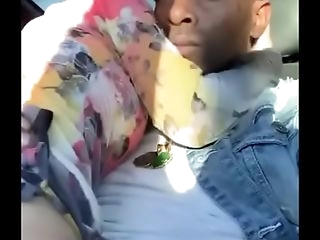 White bitch rides black cock in a car